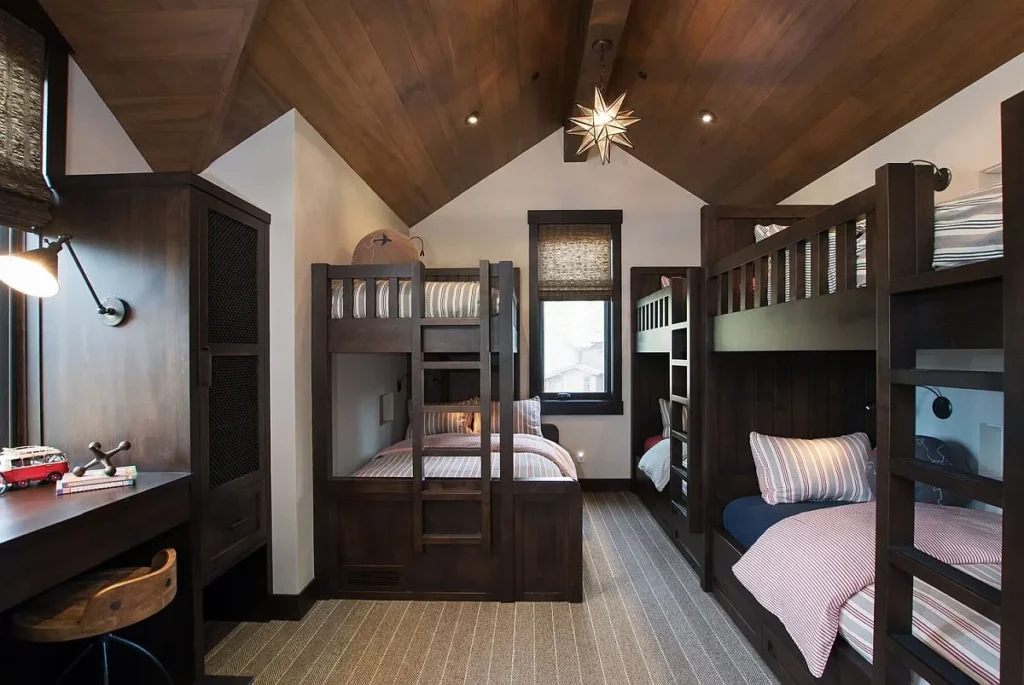 Spacious kids room with vaulted ceiling and multiple bunk beds